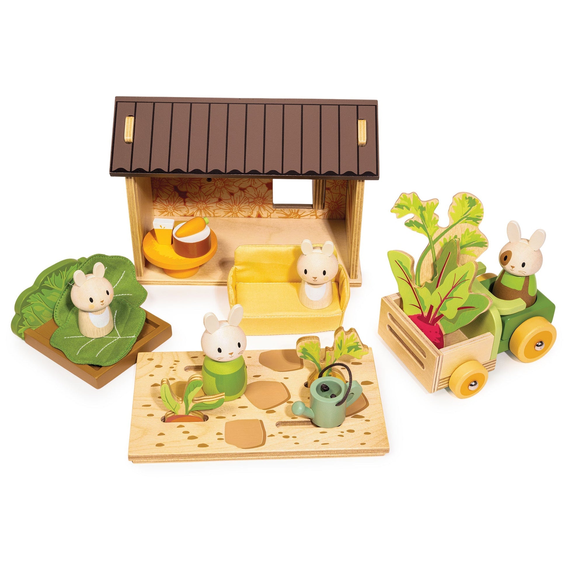 Bunny family: mum, dad, toddlers Twix and Twinkle next to the cabbage bed