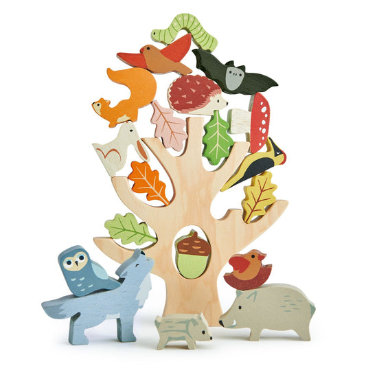 Solid beech stacking tree with 19 hand-painted woodland animals balanced on the branches, on a clean linen surface