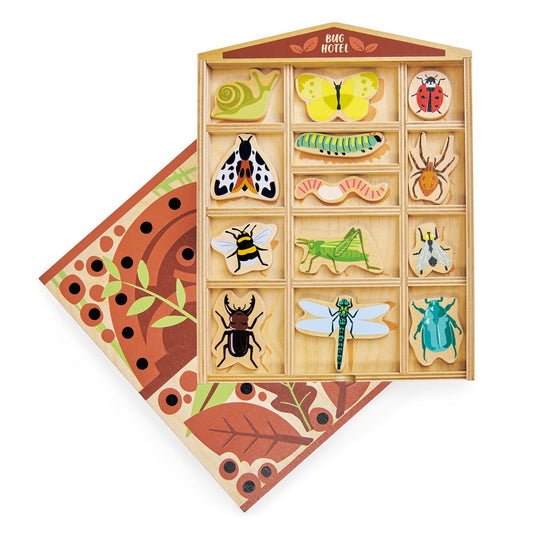 Wooden bug hotel board with thirteen illustrated garden bugs in their named slots